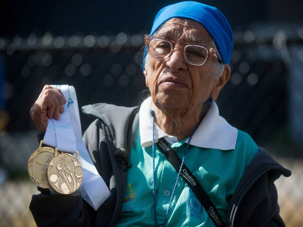 Man Kaur holds the gold medals she won in shot put and javelin events at the American Masters Games Man Kaur holds the gold medals she won in shot put and javelin events at the American Masters Games