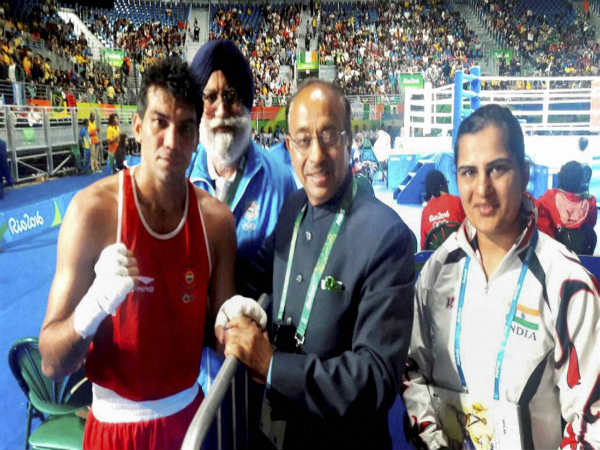 Union minister Vijay Goel greeting the Indian Boxer Manoj Kumar (left) Union minister Vijay Goel greeting the Indian Boxer Manoj Kumar (left)