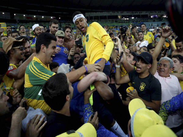 Neymar (centre) celebrates Olympic football gold with team mates Neymar (centre) celebrates Olympic football gold with team mates