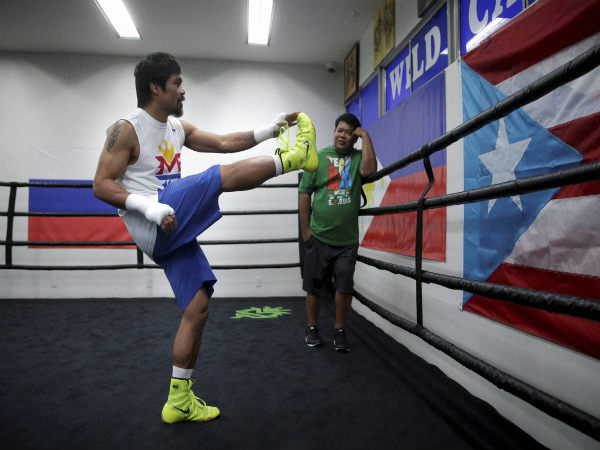 Manny Pacquiao, of the Philippines, gets ready for his boxing workout Manny Pacquiao, of the Philippines, gets ready for his boxing workout
