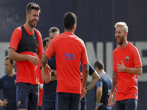 Gerard Pique (left) Luis Suarez (centre) and Lionel Messi at Barcelona training session Gerard Pique (left) Luis Suarez (centre) and Lionel Messi at Barcelona training session