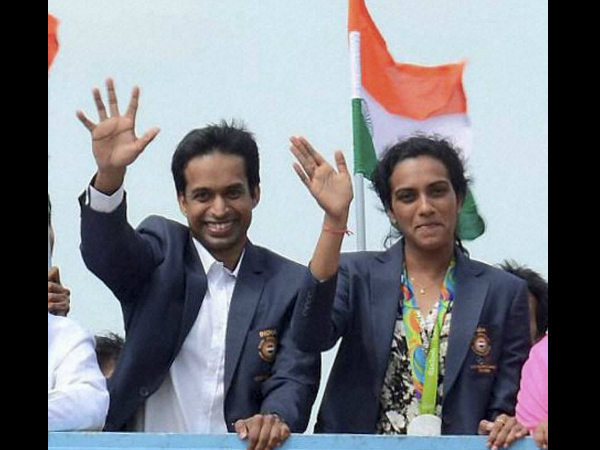 Olympic silver medalist PV Sindhu reaches Vijayawada to a rousing reception Olympic silver medalist PV Sindhu reaches Vijayawada to a rousing reception