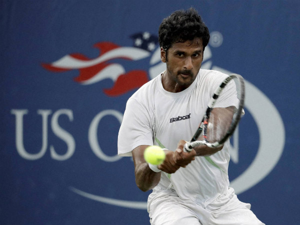 Saketh Myneni returns a shot to Jiri Vesely, during the first round of the US Open Saketh Myneni returns a shot to Jiri Vesely, during the first round of the US Open