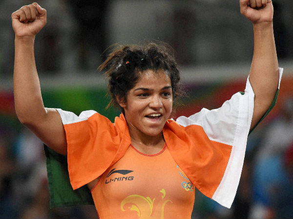 Sakshi Malik celebrates after she beat Kyrgyzstan's Aisuluu Tynybekova to win the bronze Sakshi Malik celebrates after she beat Kyrgyzstan's Aisuluu Tynybekova to win the bronze