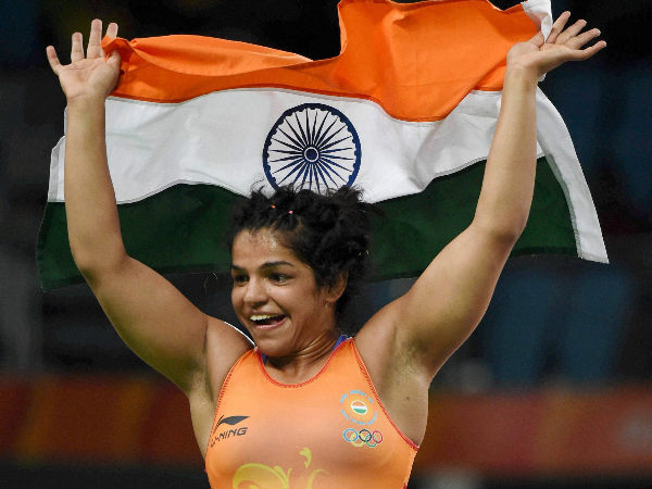 Sakshi Malik celebrates after her bronze medal effort in Rio Olympics Sakshi Malik celebrates after her bronze medal effort in Rio Olympics