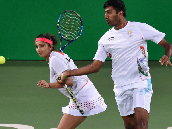 Sania Mirza-Rohan Bopanna play during their mixed doubles match Sania Mirza-Rohan Bopanna play during their mixed doubles match