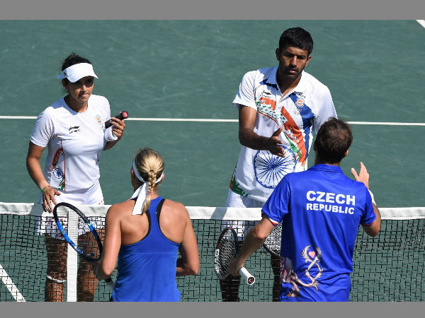 India's Sania Mirza and Rohan Bopanna during their mixed-doubles semifinal match after they lost to Czech Republic's Lucie Hradecka and Radek Stepanek. 1-6, 5-7. India's Sania Mirza and Rohan Bopanna during their mixed-doubles semifinal match after they lost to Czech Republic's Lucie Hradecka and Radek Stepanek. 1-6, 5-7.