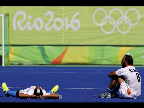 Players from India stay in the pitch a little longer after they lost to Belgium during a men's field hockey quarter final match at the 2016 Summer Olympics in Rio de Janeiro. Players from India stay in the pitch a little longer after they lost to Belgium during a men's field hockey quarter final match at the 2016 Summer Olympics in Rio de Janeiro.