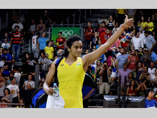 Sindhu gives the crowd thumbs up after winning against Wang Yihan in the quarter-final at Rio Olympics Sindhu gives the crowd thumbs up after winning against Wang Yihan in the quarter-final at Rio Olympics