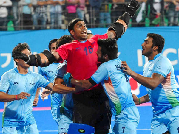 File photo: Sreejesh (red) celebrates with team-mates during a match File photo: Sreejesh (red) celebrates with team-mates during a match