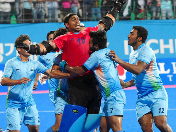 Indian hockey goalkeeper Sreejesh celebrate with team mates after beating Pakistan during the men's hockey final at 17th Asian Games Indian hockey goalkeeper Sreejesh celebrate with team mates after beating Pakistan during the men's hockey final at 17th Asian Games