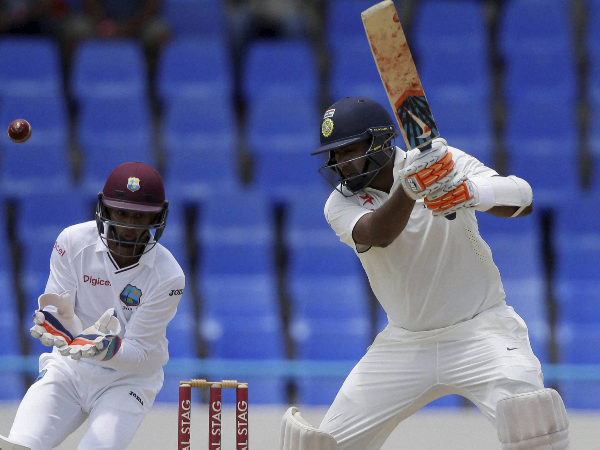 Ravichandran Ashwin plays a shot under the look of West Indies' wicketkeeper Shane Dorwich Ravichandran Ashwin plays a shot under the look of West Indies' wicketkeeper Shane Dorwich