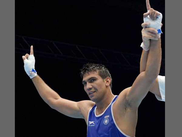 Manoj Kumar being declared winner in a match against Lesotho's Moshoeshoe M Les during the Men's Light Welter 64kg boxing round match of the Commonwealth Games Manoj Kumar being declared winner in a match against Lesotho's Moshoeshoe M Les during the Men's Light Welter 64kg boxing round match of the Commonwealth Games