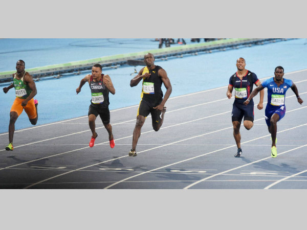Usain Bolt (centre) wins the 100m race at Rio Olympics Usain Bolt (centre) wins the 100m race at Rio Olympics