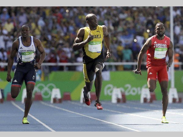 Jamaica's Usain Bolt, centre, Trinidad and Tobago's Richard Thompson, right, and Britain's James Dasaolu compete in a men's 100-metre heat at Rio Olympics Jamaica's Usain Bolt, centre, Trinidad and Tobago's Richard Thompson, right, and Britain's James Dasaolu compete in a men's 100-metre heat at Rio Olympics