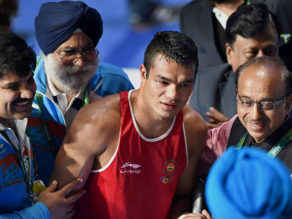 Indian boxer Vikash Krishan (in red) is congratulated by Union sports minister Vijay Goyal (right) after defeating Charles Albert Shone Conwell of USA in Rio Olympics on Tuesday (August 9). Indian boxer Vikash Krishan (in red) is congratulated by Union sports minister Vijay Goyal (right) after defeating Charles Albert Shone Conwell of USA in Rio Olympics on Tuesday (August 9).