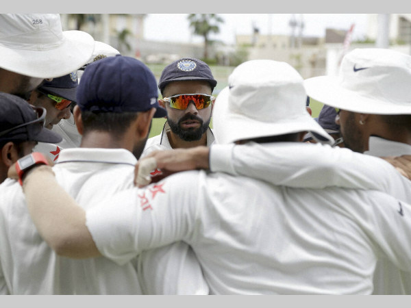 Virat Kohli (facing the camera) talks to his team-mates during the 2nd Test Virat Kohli (facing the camera) talks to his team-mates during the 2nd Test
