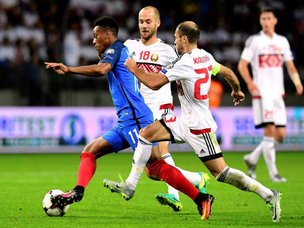 Anthony Martial (blue) edges past Belarus defenders (Image courtesy: Equipe de France Twitter handle) Anthony Martial (blue) edges past Belarus defenders (Image courtesy: Equipe de France Twitter handle)