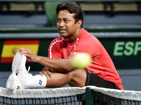 Paes stretches stretches during a practice session in New Delhi on Monday (September 12) as he gets ready to face Spain in Davis Cup Paes stretches stretches during a practice session in New Delhi on Monday (September 12) as he gets ready to face Spain in Davis Cup