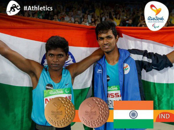 Golden moment: Thangavelu (left) and Varun. Photo from Rio Paralympics Twitter page Golden moment: Thangavelu (left) and Varun. Photo from Rio Paralympics Twitter page