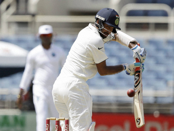 Cheteshwar Pujara plays a shot Cheteshwar Pujara plays a shot