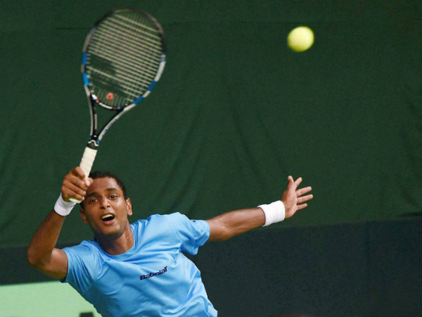 India's Ramkumar Ramanathan returs during the singles match against Spain's Feliciano Lopez in the Davis Cup India's Ramkumar Ramanathan returs during the singles match against Spain's Feliciano Lopez in the Davis Cup