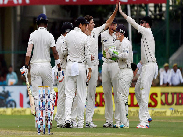 Mitchell Santner celebrates with his teammates after dismissing K.L. Rahul Mitchell Santner celebrates with his teammates after dismissing K.L. Rahul
