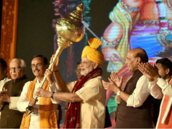 PM being presented a mace at Aishbag in Lucknow