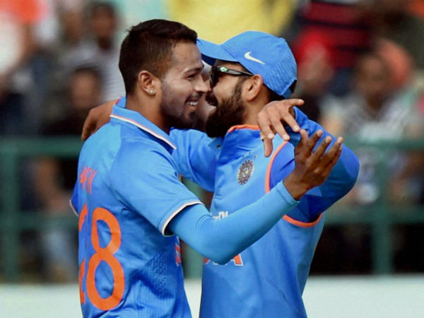 Pandya (left) and Kohli celebrate a wicket in the 1st ODI against New Zealand in Dharamsala Pandya (left) and Kohli celebrate a wicket in the 1st ODI against New Zealand in Dharamsala