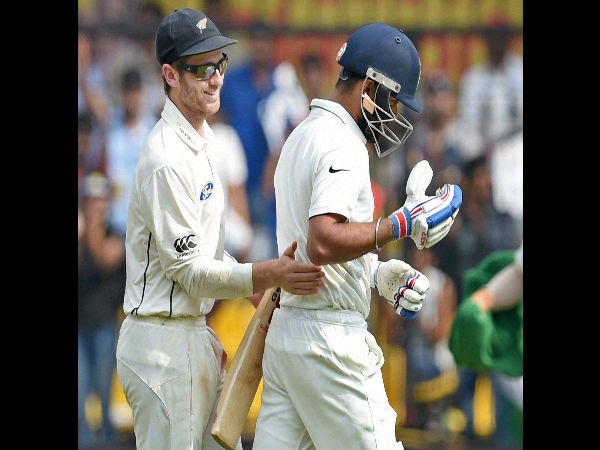New Zealand captain Kane Williamson greets Indian captain Virat Kohli for his magnificent inning as he walks to pavilion after his dismissal during the third test match in Indore on Sunday. New Zealand captain Kane Williamson greets Indian captain Virat Kohli for his magnificent inning as he walks to pavilion after his dismissal during the third test match in Indore on Sunday.
