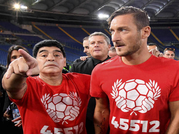 Diego Maradona (left) and Francesco Totti Diego Maradona (left) and Francesco Totti