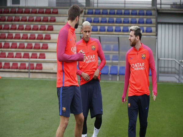 Lionel Messi (left) at Barcelona training Lionel Messi (left) at Barcelona training