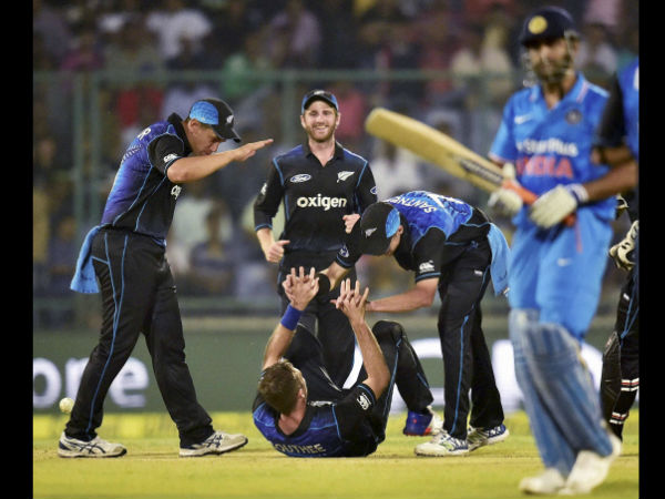 New Zealand cricketers celebrate the wicket of Indian batsman M S Dhoni during 2nd ODI New Zealand cricketers celebrate the wicket of Indian batsman M S Dhoni during 2nd ODI