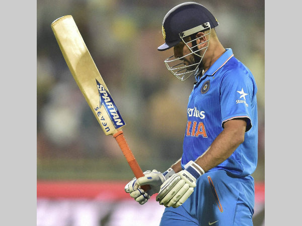 A disappointed Dhoni leaves the field after being dismissed by Tim Southee A disappointed Dhoni leaves the field after being dismissed by Tim Southee