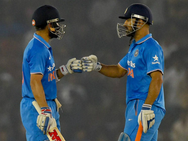 Kohli (left) and Dhoni during their partnership in the 3rd ODI in Mohali Kohli (left) and Dhoni during their partnership in the 3rd ODI in Mohali