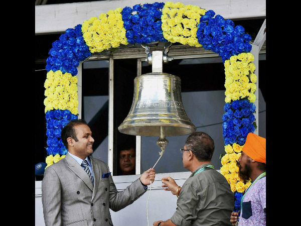 Virender Sehwag rings the bell during 3rd day of the 2nd Test match between India and New Zealand at Eden Garden in Kolkata on Sunday. Virender Sehwag rings the bell during 3rd day of the 2nd Test match between India and New Zealand at Eden Garden in Kolkata on Sunday.