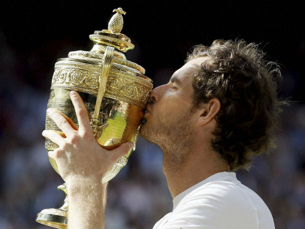 dy Murray of Britain kisses his trophy after beating Milos Raonic of Canada in the men's singles final on day fourteen of the Wimbledon Tennis Championships in London dy Murray of Britain kisses his trophy after beating Milos Raonic of Canada in the men's singles final on day fourteen of the Wimbledon Tennis Championships in London