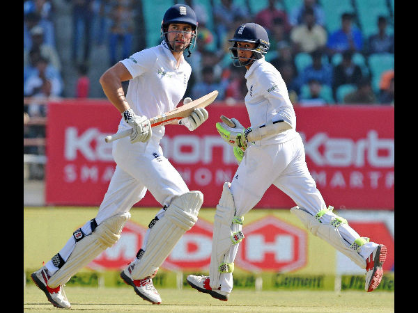 Hameed (right) runs between the wickets with his opening partner and captain Alastair Cook during the Rajkot Test Hameed (right) runs between the wickets with his opening partner and captain Alastair Cook during the Rajkot Test