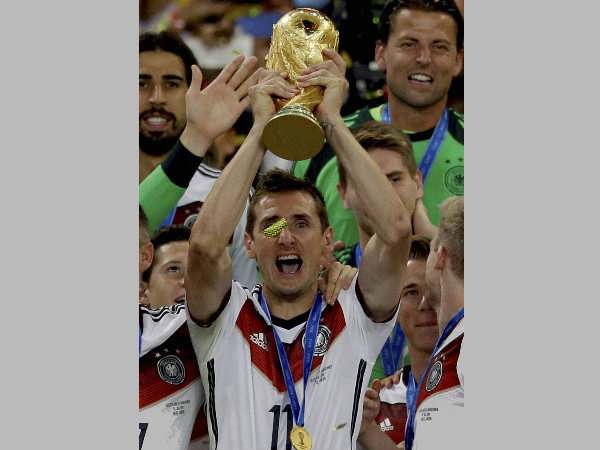 Miroslav Klose holds the FIFA World Cup 2014 trophy Miroslav Klose holds the FIFA World Cup 2014 trophy