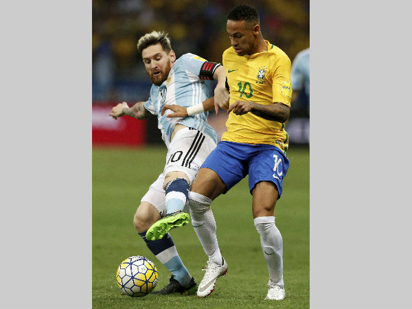 Lionel Messi, left, and Neymar fight for the ball during a 2018 World Cup qualifying soccer match at the Estadio Mineirao in Belo Horizonte Lionel Messi, left, and Neymar fight for the ball during a 2018 World Cup qualifying soccer match at the Estadio Mineirao in Belo Horizonte