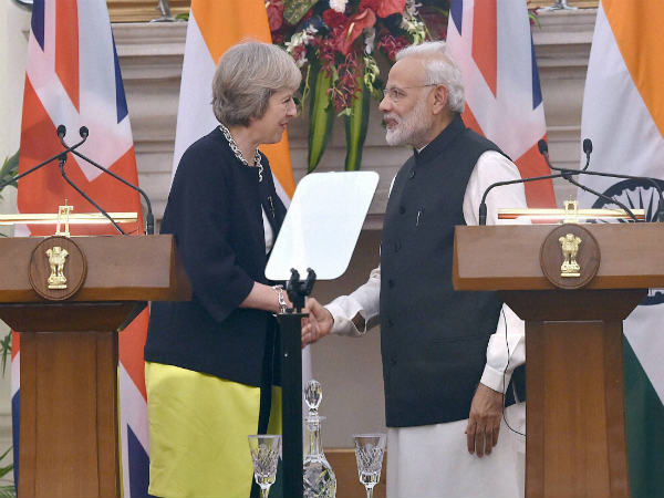 Prime Minister Narendra Modi (right) and UK Prime Minister Theresa May shake hands during the joint statement at Hyderabad House in New Delhi Prime Minister Narendra Modi (right) and UK Prime Minister Theresa May shake hands during the joint statement at Hyderabad House in New Delhi