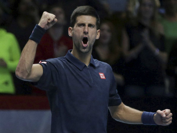Serbia's Novak Djokovic celebrates winning his ATP World Tour Finals tennis match against Austria's Dominic Thiem at the O2 Arena in London. Serbia's Novak Djokovic celebrates winning his ATP World Tour Finals tennis match against Austria's Dominic Thiem at the O2 Arena in London.