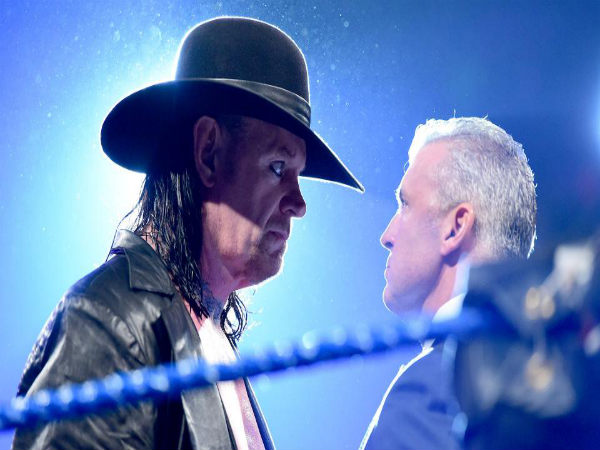 Undertaker face to face with Shane McMahon (Image courtesy wwe.com) Undertaker face to face with Shane McMahon (Image courtesy wwe.com)