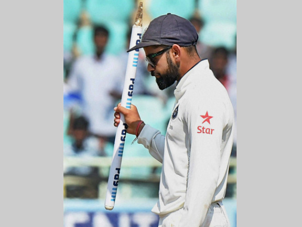 Virat Kohli carries a stump after winning the 2nd Test against England in Visakhapatnam Virat Kohli carries a stump after winning the 2nd Test against England in Visakhapatnam