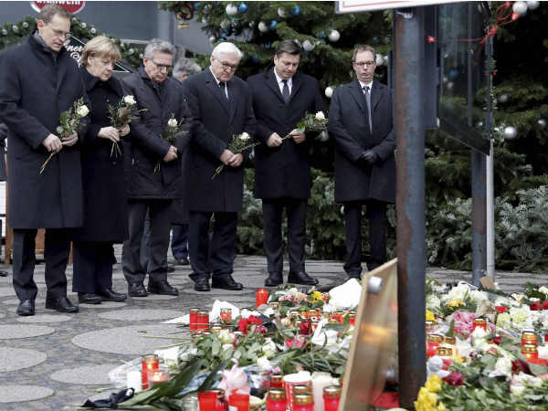 Merkel visits Berlin attack site Merkel visits Berlin attack site