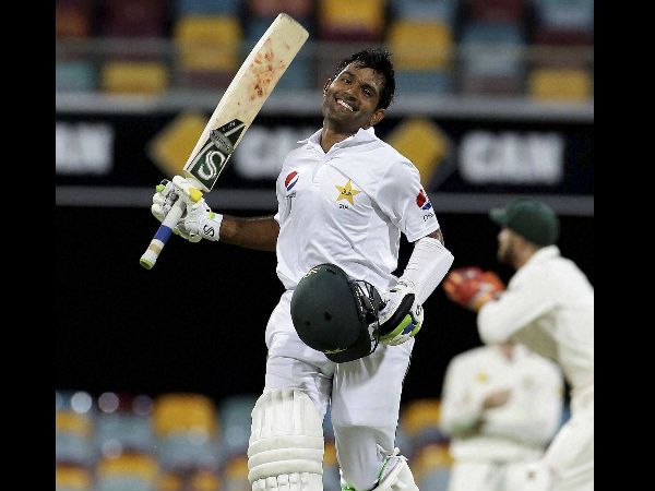 Pakistan's Asad Shafiq reaches 100 runs during play on day four of the first cricket test between Australia and Pakistan in Brisbane, Australia, Sunday, Dec. 18 Pakistan's Asad Shafiq reaches 100 runs during play on day four of the first cricket test between Australia and Pakistan in Brisbane, Australia, Sunday, Dec. 18