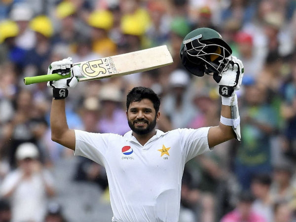 Pakistan's Azhar Ali celebrates scoring a century against Australia on the second day of their second cricket test match in Melbourne, Australia Pakistan's Azhar Ali celebrates scoring a century against Australia on the second day of their second cricket test match in Melbourne, Australia