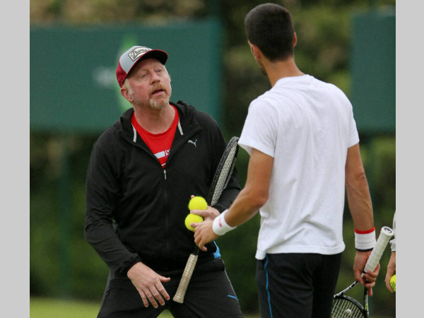 File photo: Becker talking to Djokovic (right) File photo: Becker talking to Djokovic (right)