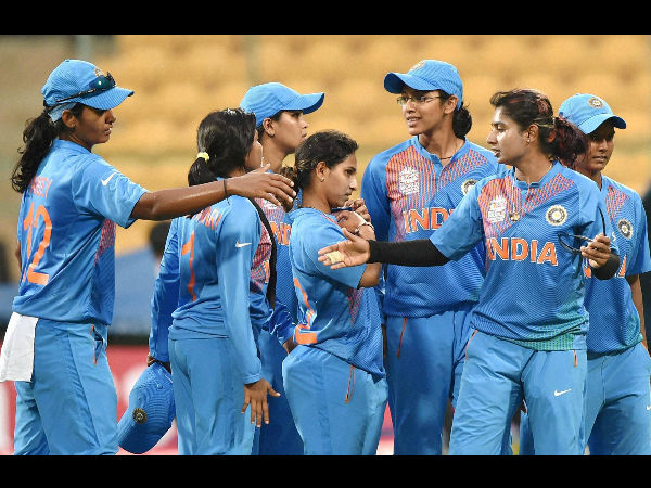 India's cricketers celebrate their win over Bangladesh in the ICC Women's World T20 match at Chinnaswamy Stadium in Bengaluru on Tuesday. India's cricketers celebrate their win over Bangladesh in the ICC Women's World T20 match at Chinnaswamy Stadium in Bengaluru on Tuesday.
