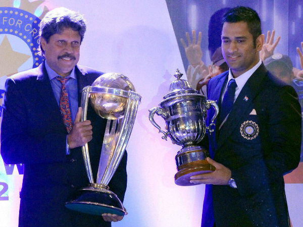 File photo: Kapil (left) and Dhoni after exchanging their World Cup trophies File photo: Kapil (left) and Dhoni after exchanging their World Cup trophies